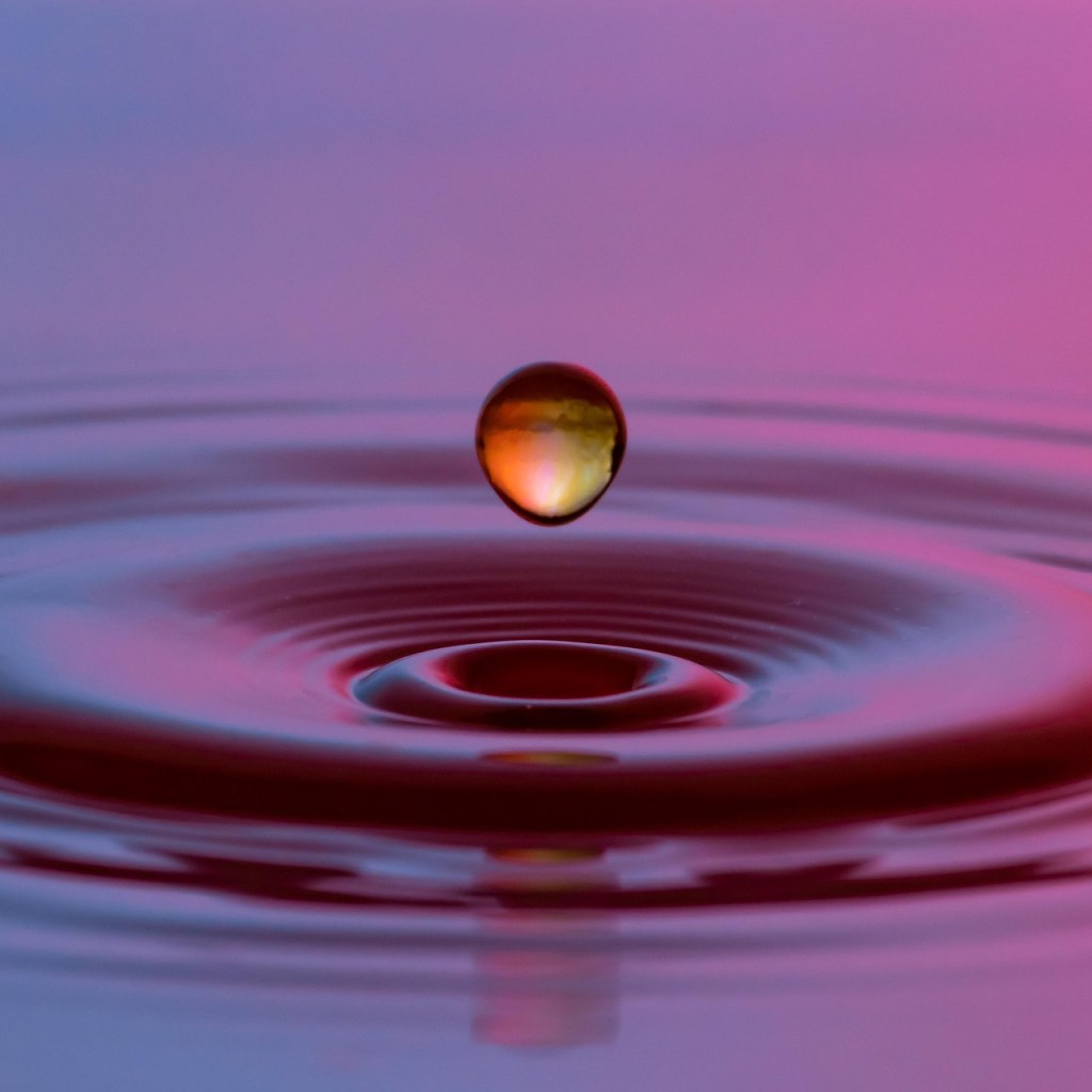 Water droplet and ripple, symbolic of hypnosis state.